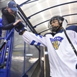 POPRAD, SLOVAKIA - APRIL 16: Finland's Aarre Isiguzo #6 high fives a fan while walking to the ice prior to preliminary round action against Latvia at the 2017 IIHF Ice Hockey U18 World Championship. (Photo by Andrea Cardin/HHOF-IIHF Images)


